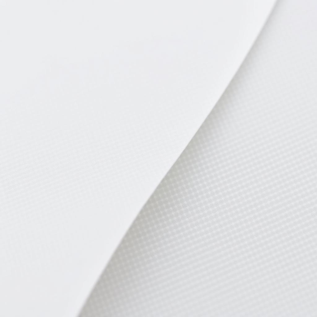 Micro dot fusible interlining fabric showing fine adhesive dot pattern